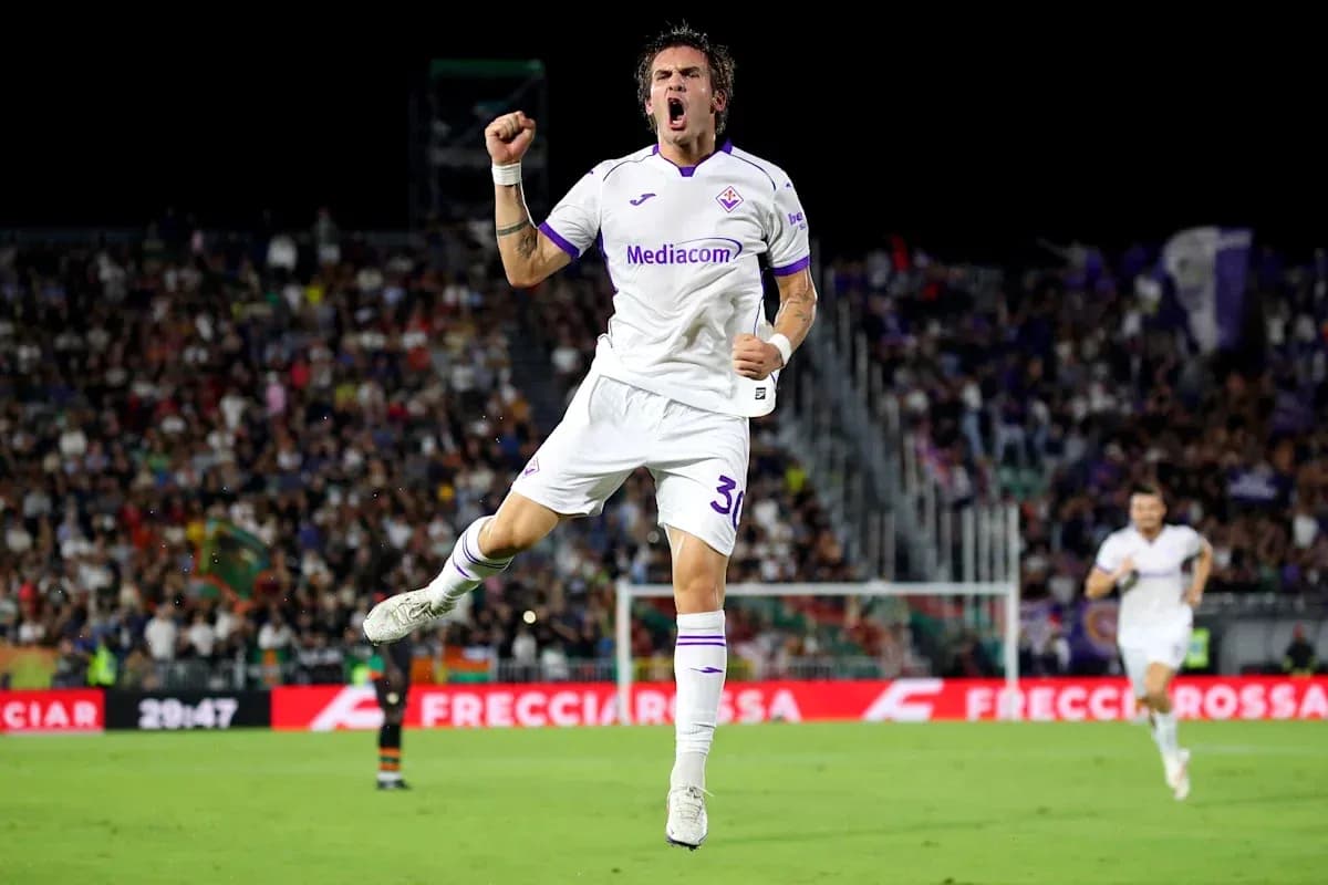 Fiorentina player celebrating a goal on field Fiorentina player celebrating a goal on field