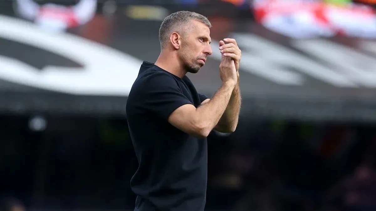 Coach gesturing during a match on the sidelines Coach gesturing during a match on the sidelines