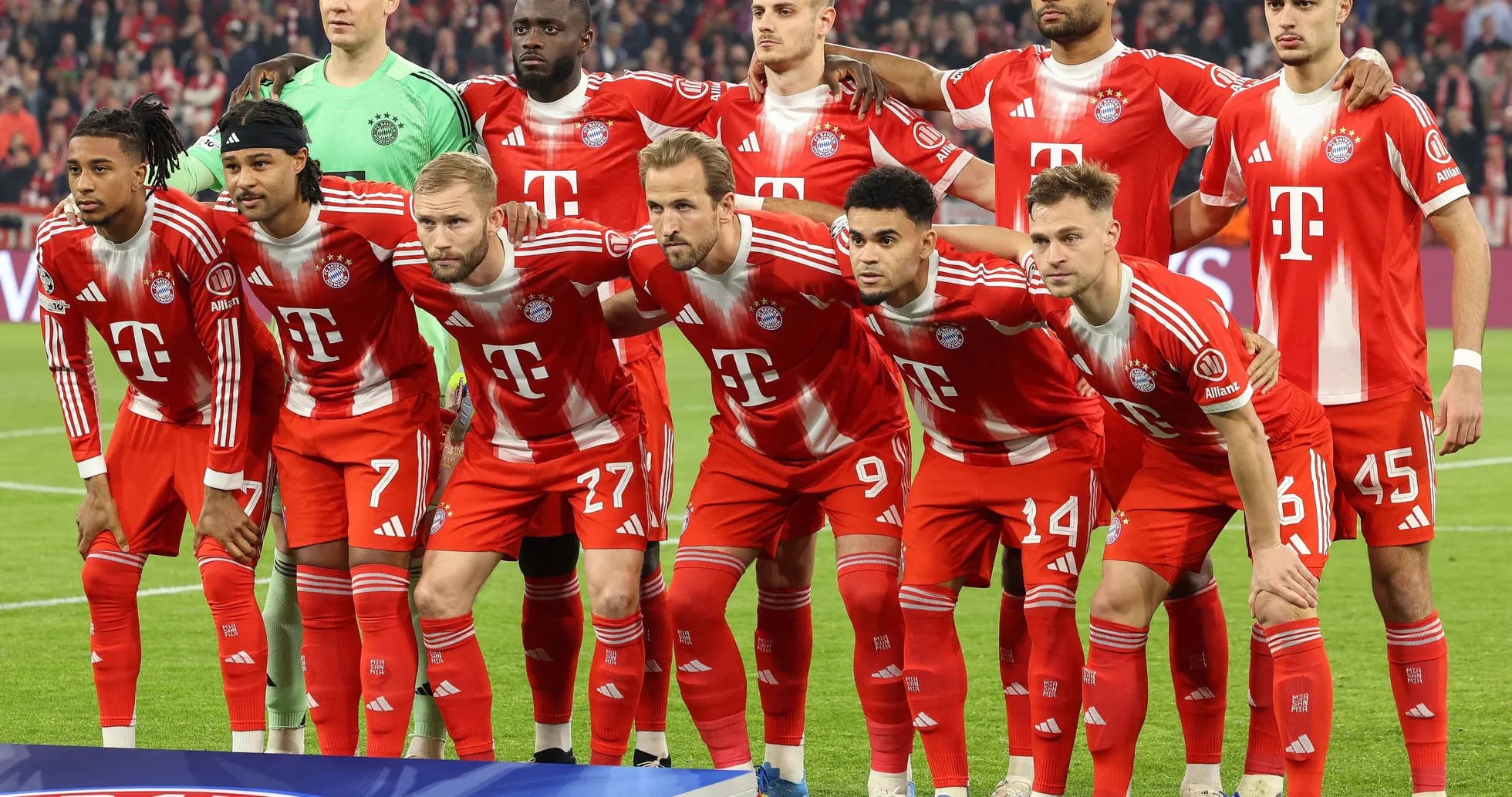 Bayern Munich team posing for a group photo Bayern Munich team posing for a group photo
