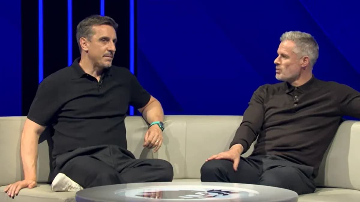 Two analysts discussing on a television set Two analysts discussing on a television set