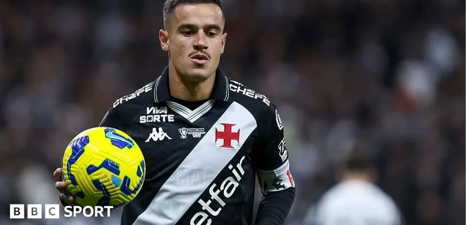 Player holding ball during football match action Player holding ball during football match action