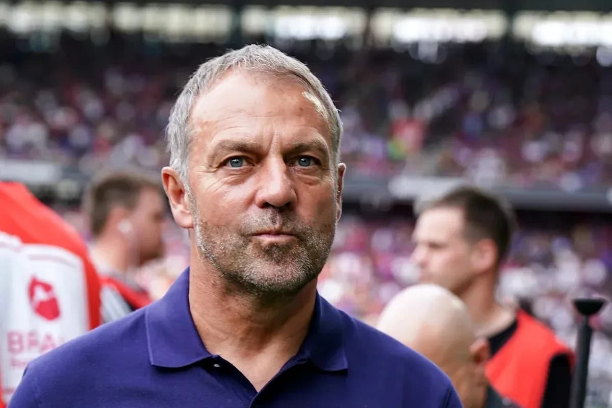 Coach standing on the sidelines during a match Coach standing on the sidelines during a match