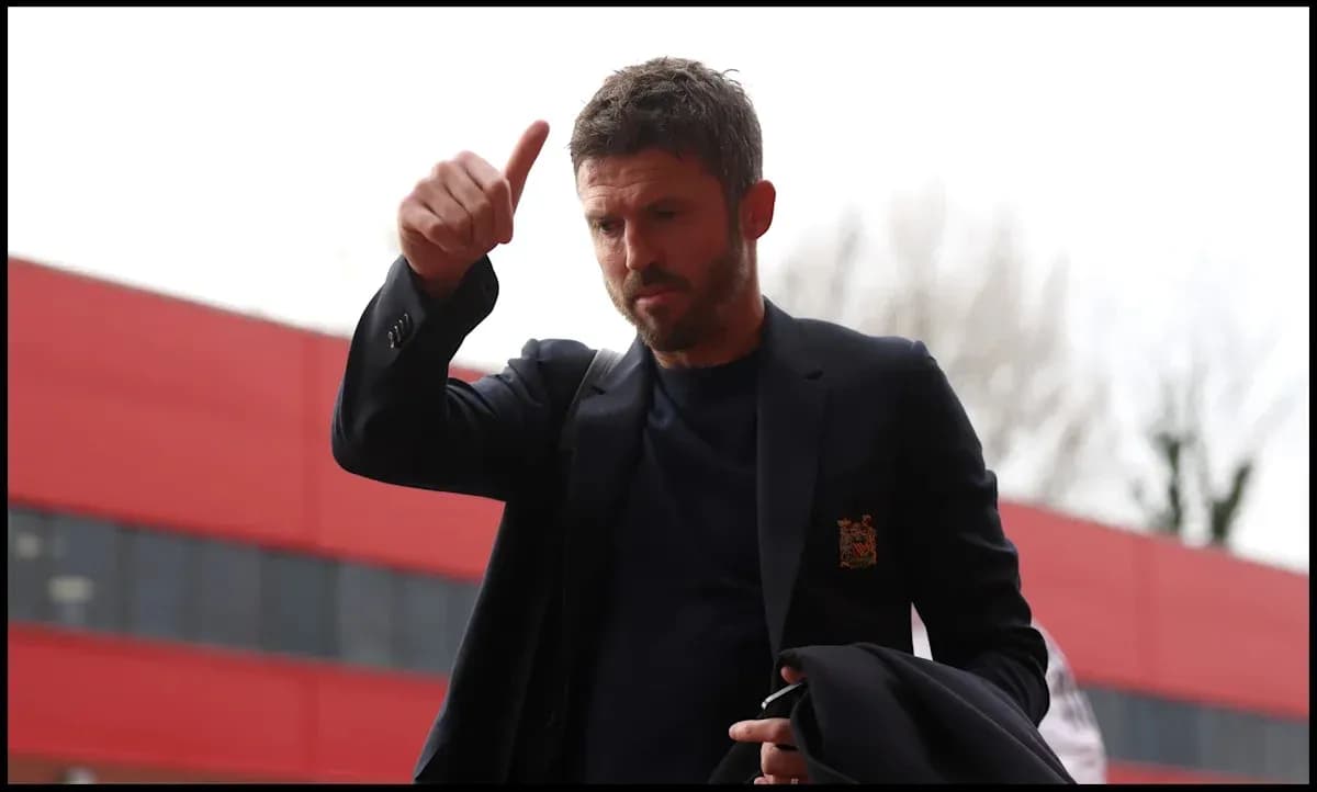 Manager giving a thumbs up outside stadium Manager giving a thumbs up outside stadium