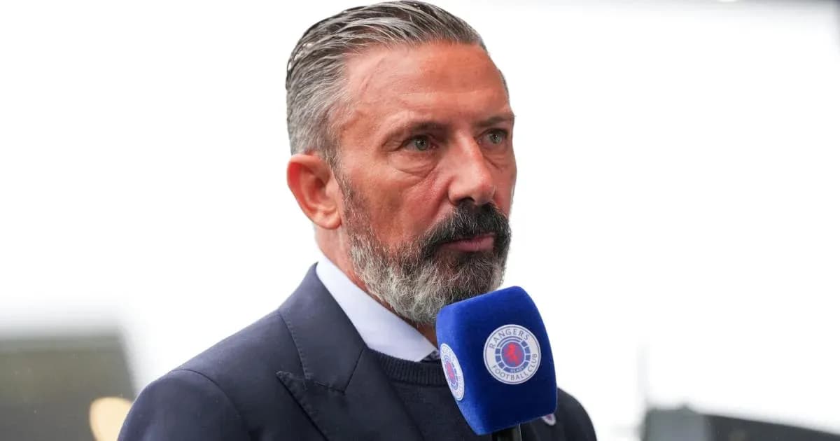 Person speaking into microphone at event Person speaking into microphone at event