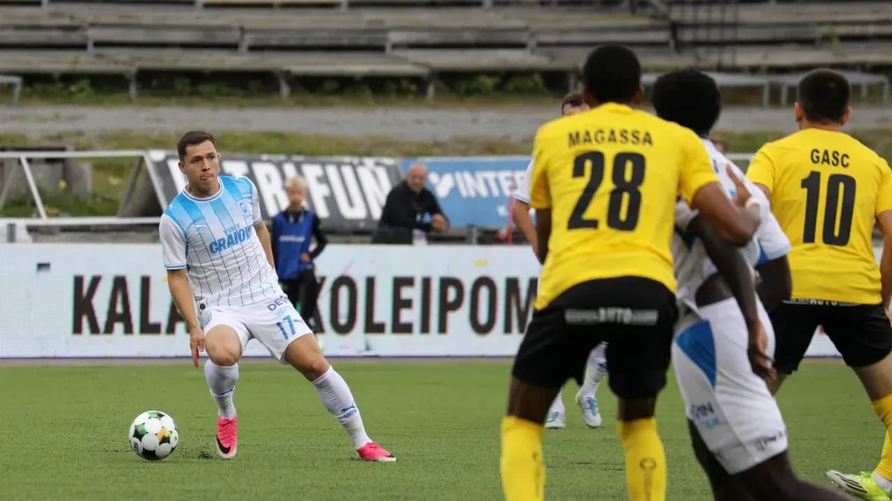 Player from Universitatea Craiova dribbling the ball Player from Universitatea Craiova dribbling the ball