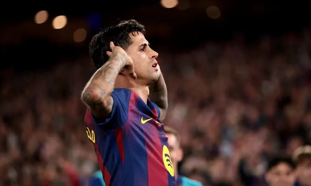 Player celebrating a goal at the stadium Player celebrating a goal at the stadium
