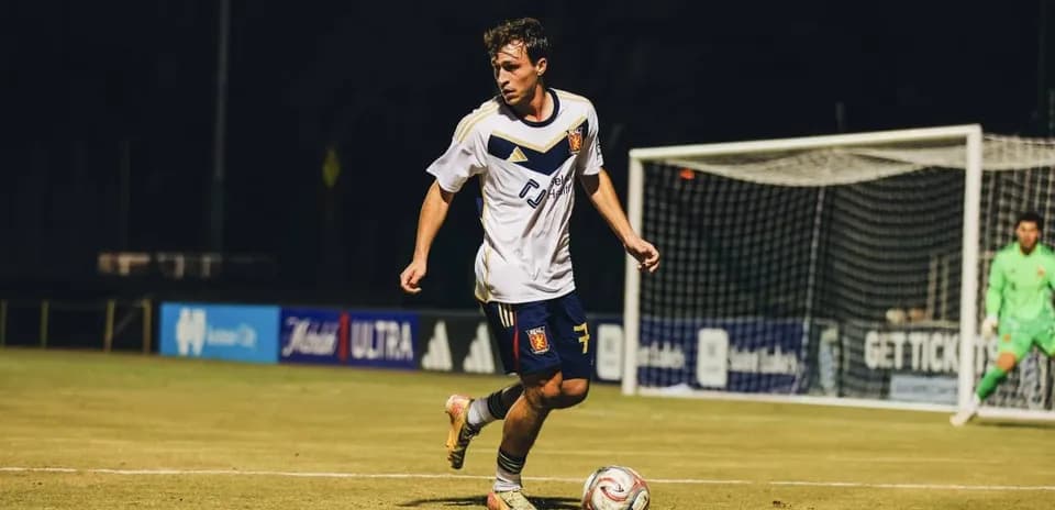 Real Monarchs player dribbling the ball during match Real Monarchs player dribbling the ball during match