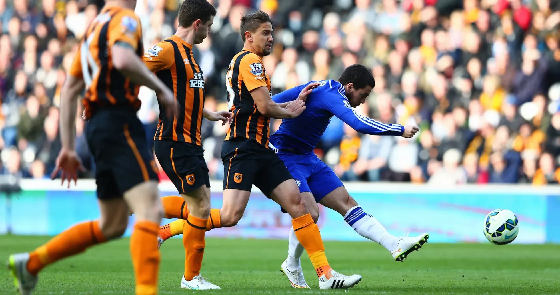 Chelsea player taking a shot against Hull City Chelsea player taking a shot against Hull City
