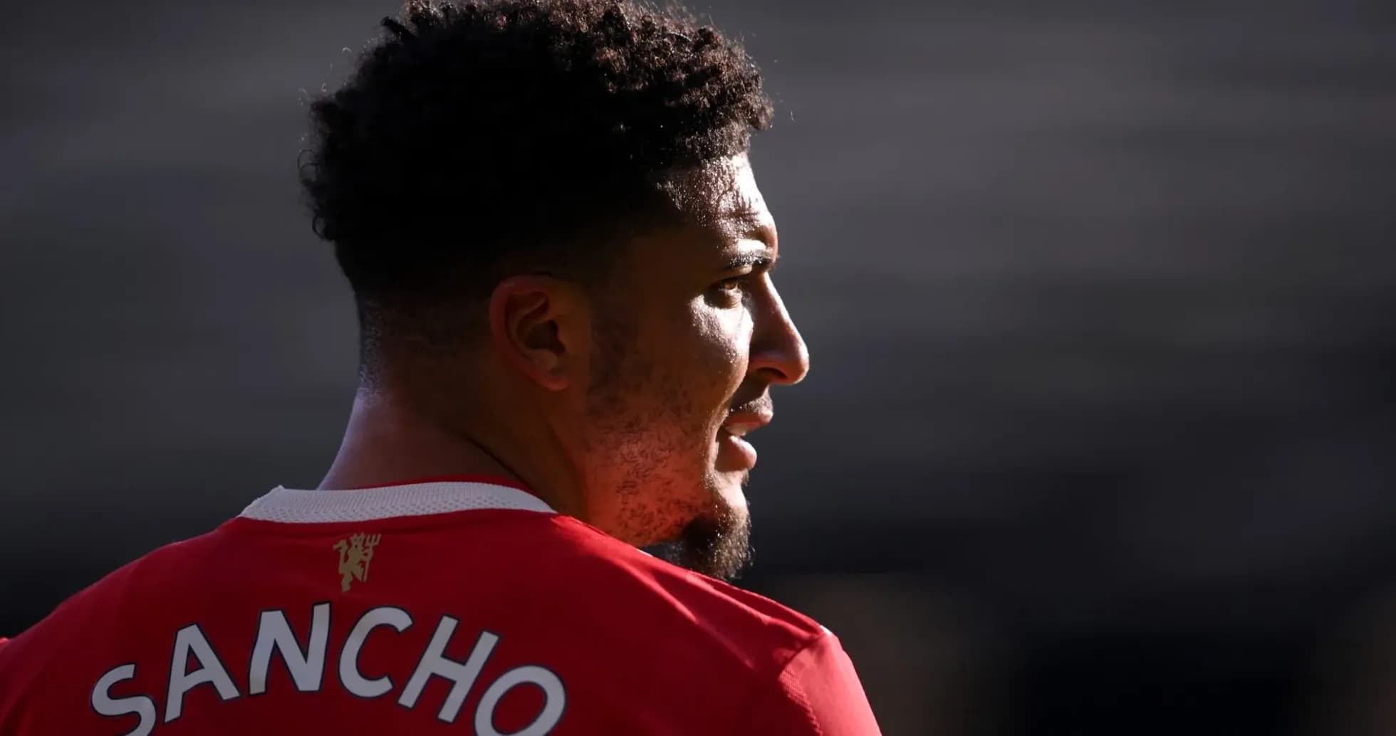 Player wearing red jersey with name SANCHO visible Player wearing red jersey with name SANCHO visible