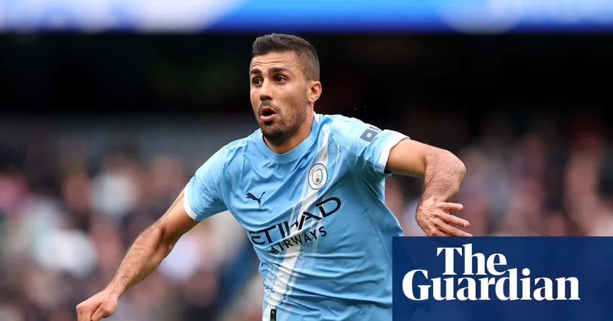 Player in light blue kit celebrating a goal Player in light blue kit celebrating a goal