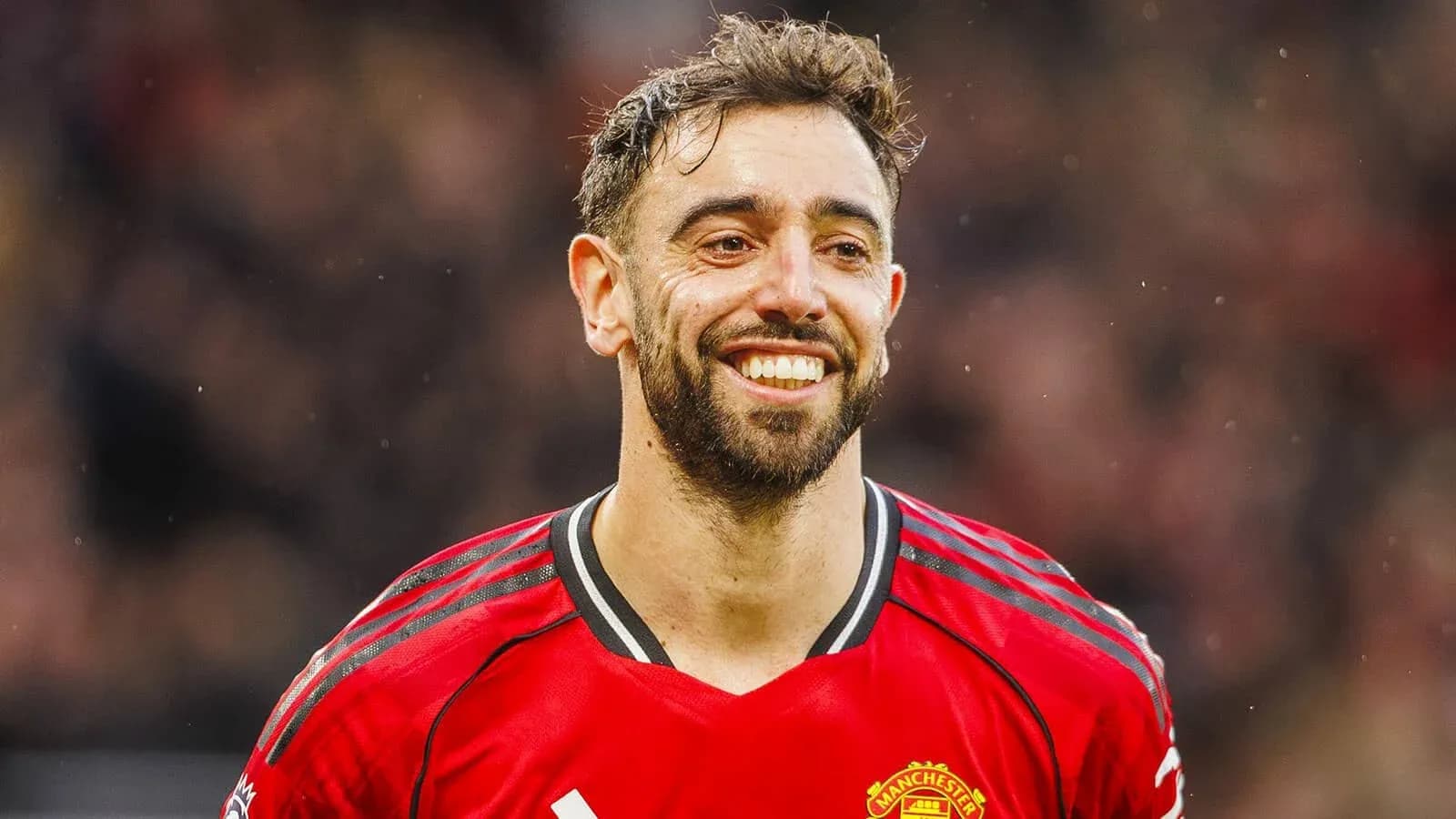 Bruno Fernandes smiling in Manchester United jersey Bruno Fernandes smiling in Manchester United jersey