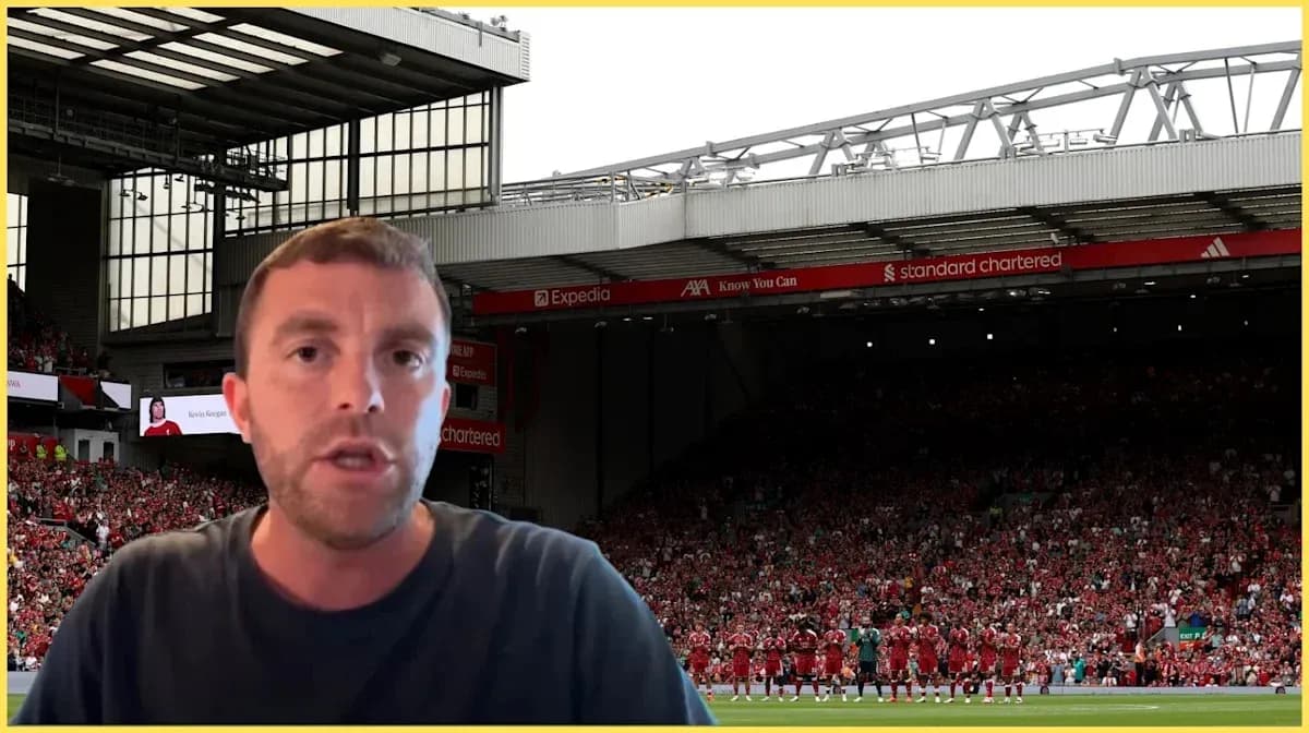 Presenter speaking with Liverpool team in background Presenter speaking with Liverpool team in background