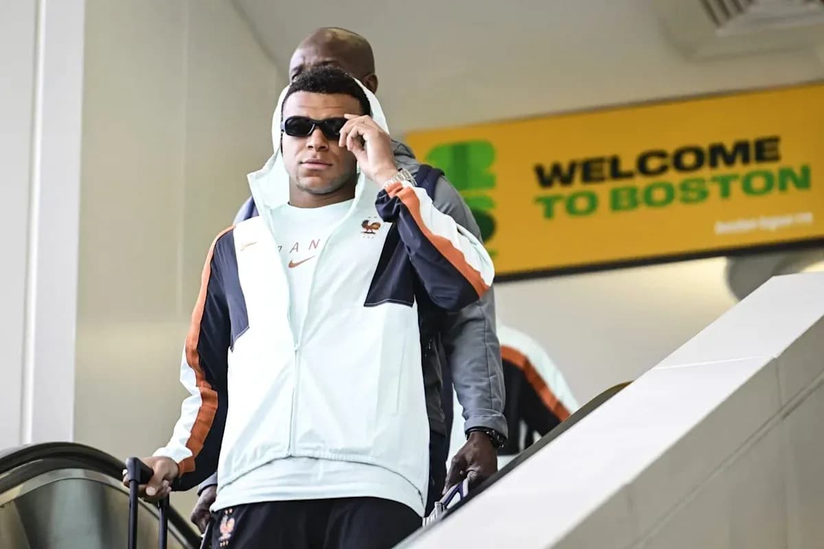 Player arriving at Boston airport wearing sunglasses Player arriving at Boston airport wearing sunglasses