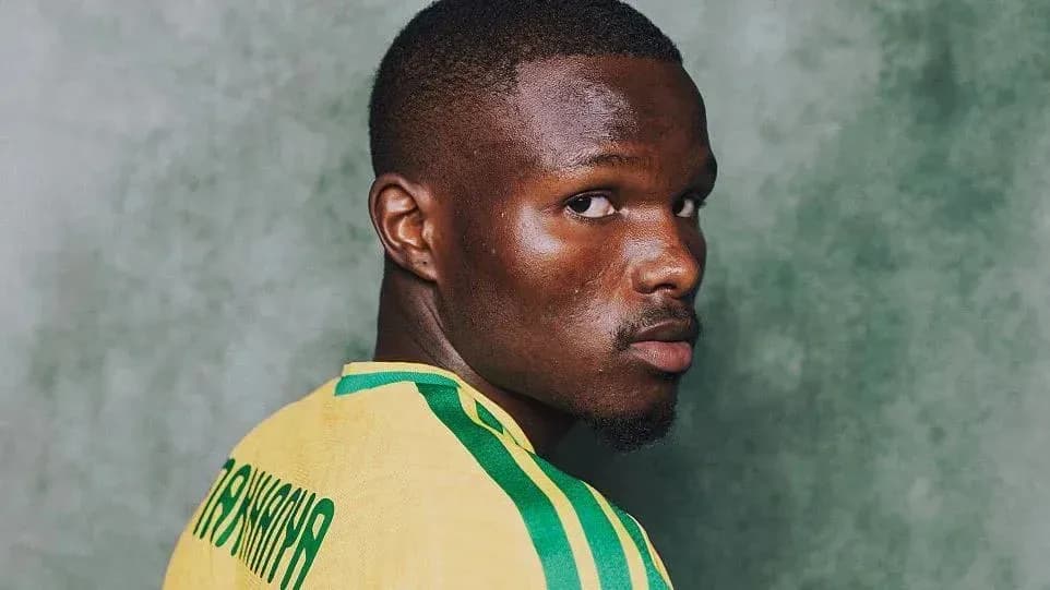 Player posing in national team jersey with green background Player posing in national team jersey with green background