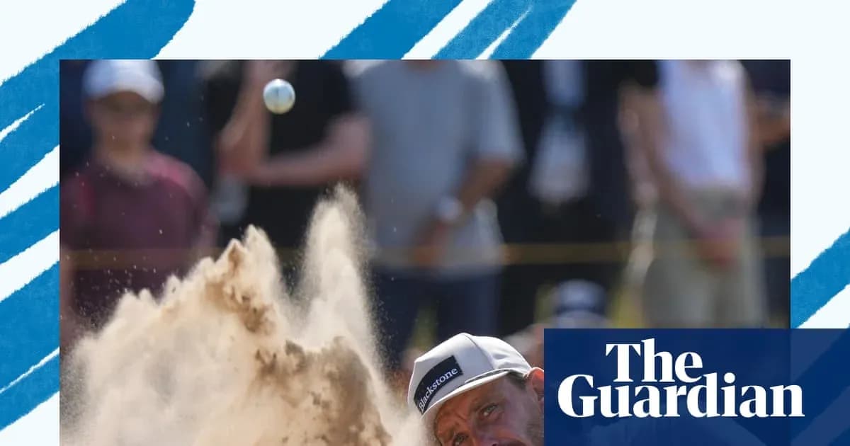 Golfer hitting a ball from a sand trap Golfer hitting a ball from a sand trap