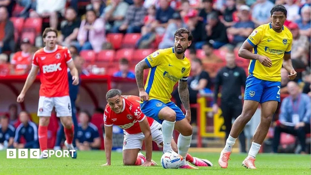 Players from Charlton Athletic and Portsmouth during match Players from Charlton Athletic and Portsmouth during match