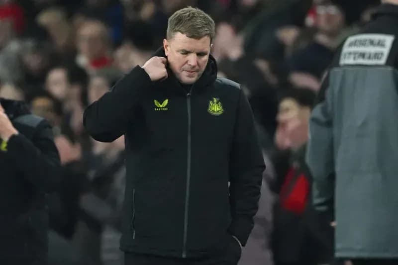 Newcastle manager walking off the pitch after match Newcastle manager walking off the pitch after match
