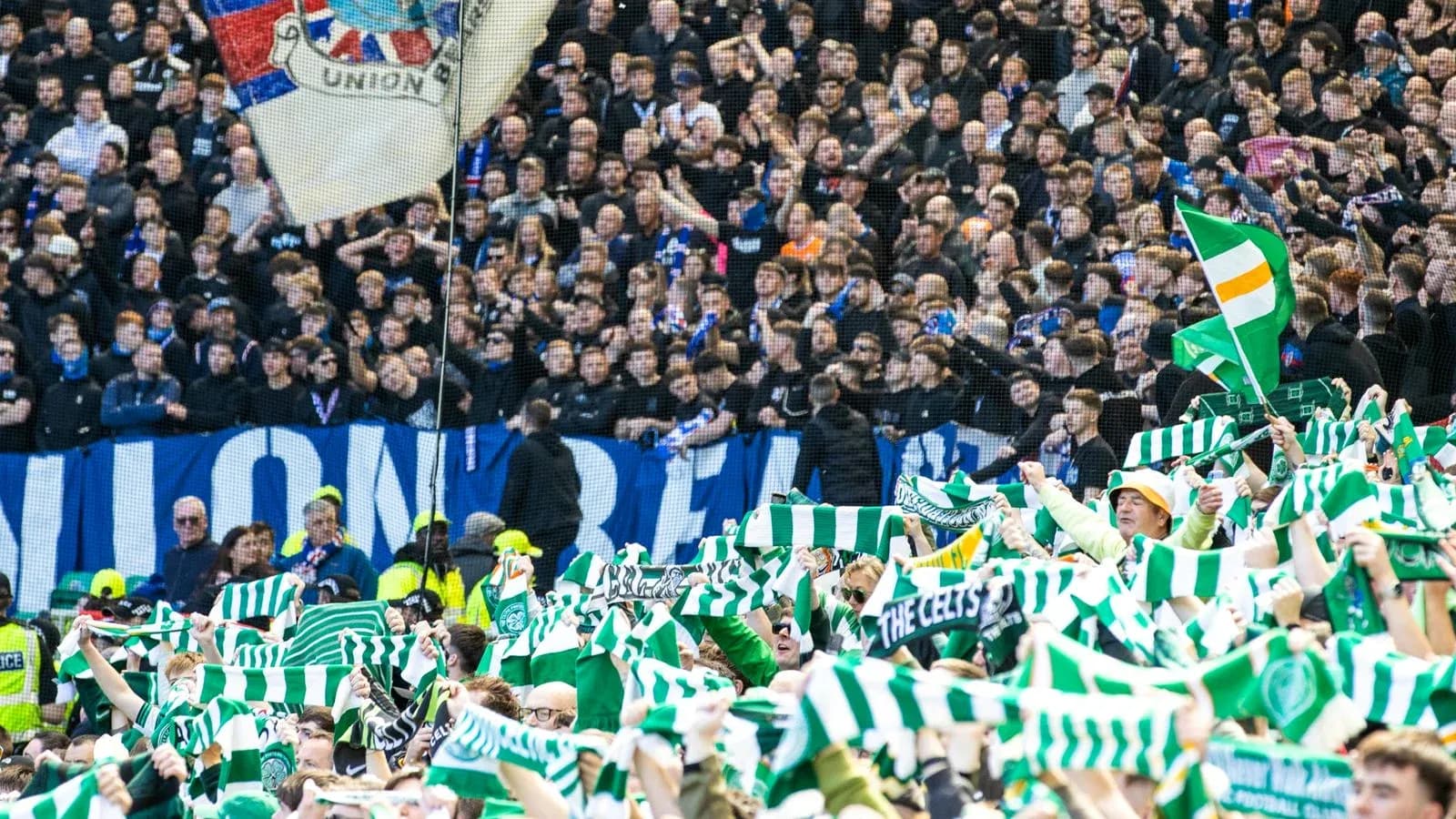 Celtic fans waving scarves during a match Celtic fans waving scarves during a match