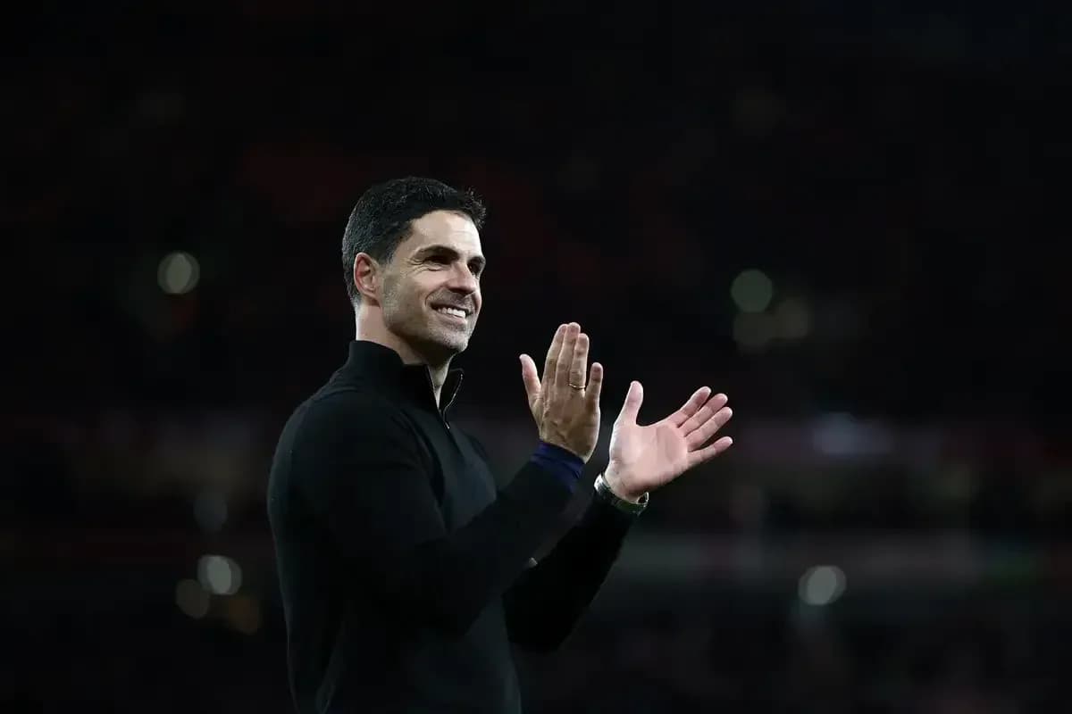 Manager applauding during match at stadium Manager applauding during match at stadium