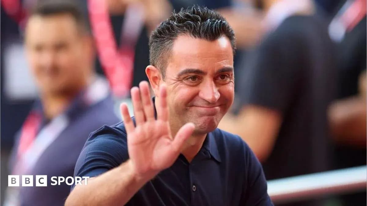 Coach waving to fans during event Coach waving to fans during event