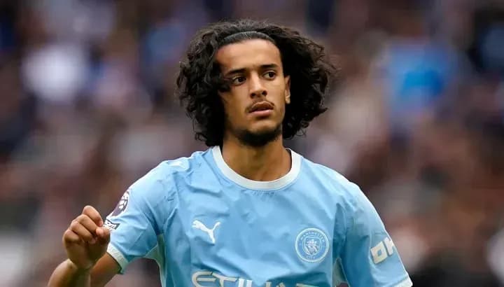 Player in light blue jersey during match action Player in light blue jersey during match action