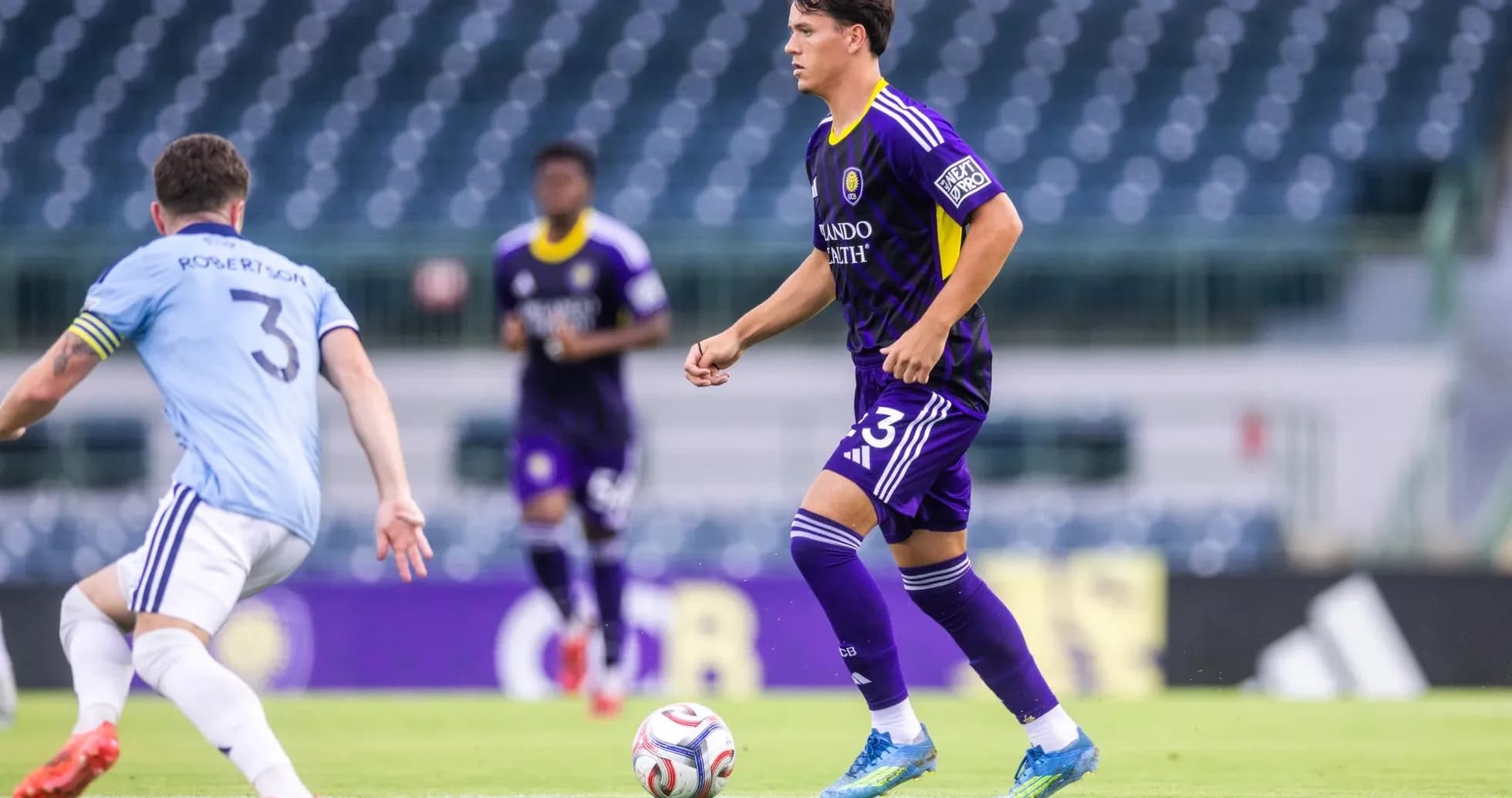 Orlando City II player dribbling the ball Orlando City II player dribbling the ball