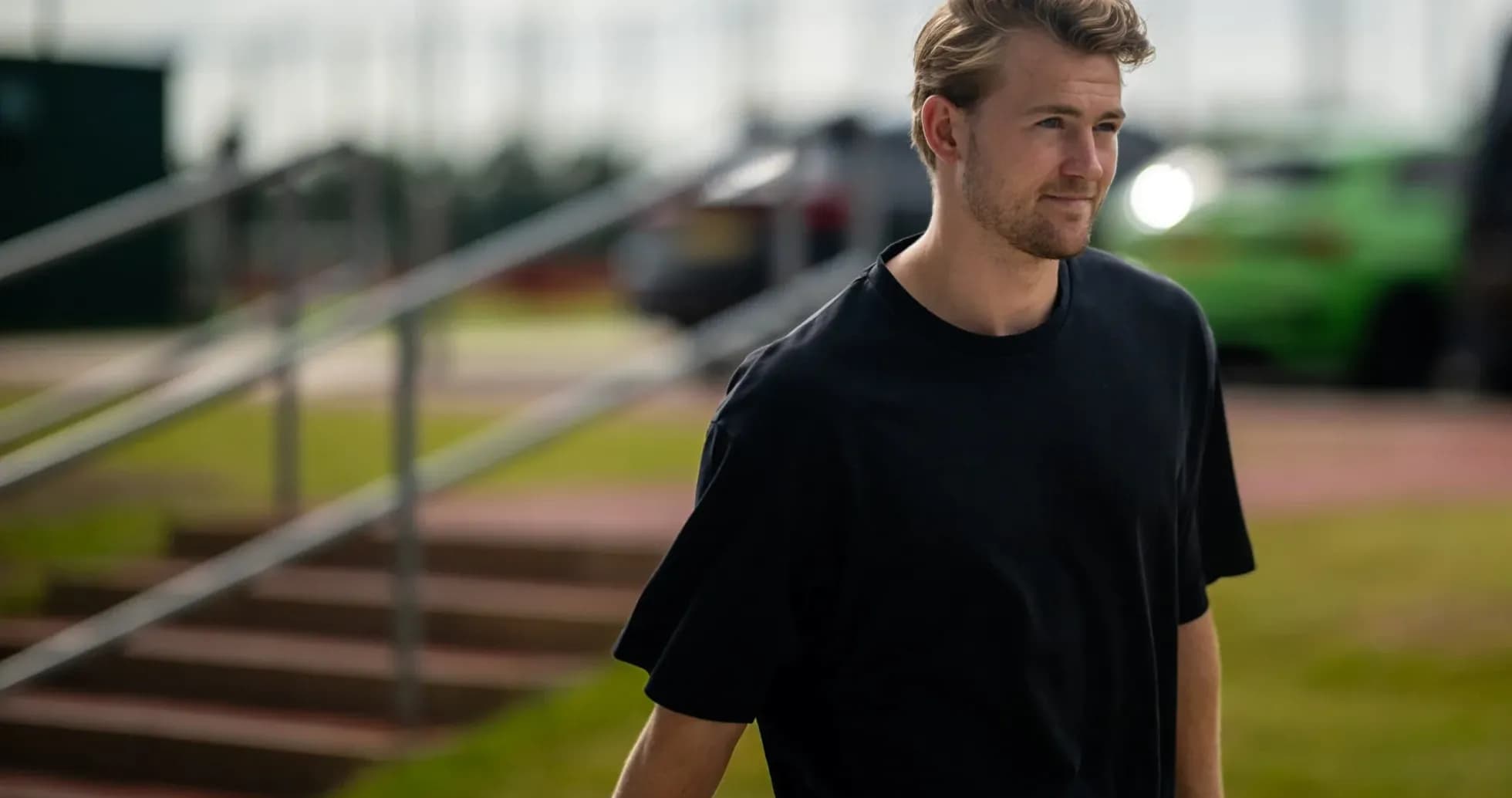 Player walking towards training facility entrance Player walking towards training facility entrance