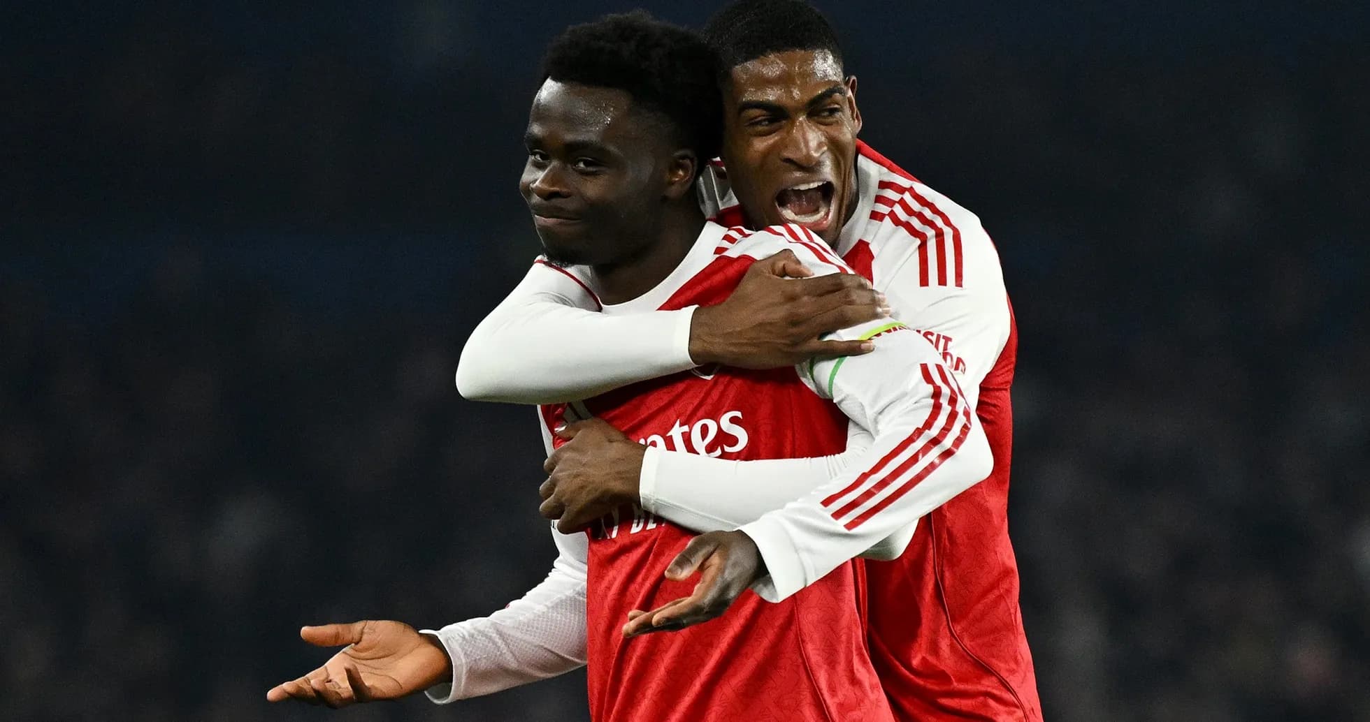 Arsenal players celebrating a goal together Arsenal players celebrating a goal together