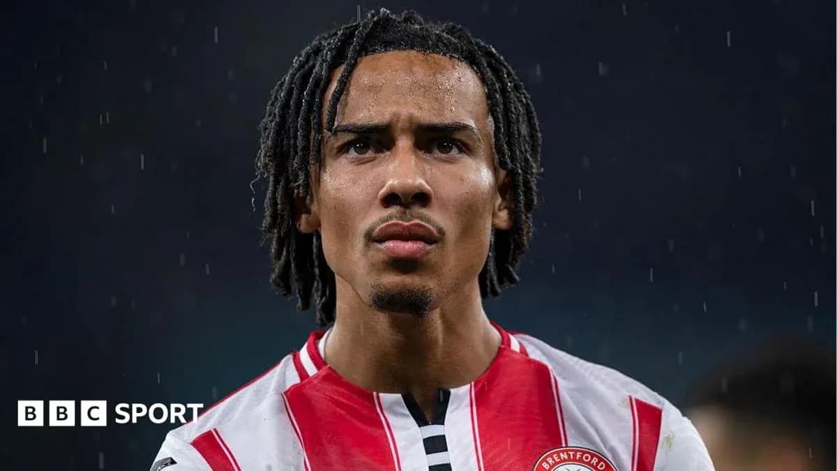 Brentford player in rain during match close-up Brentford player in rain during match close-up