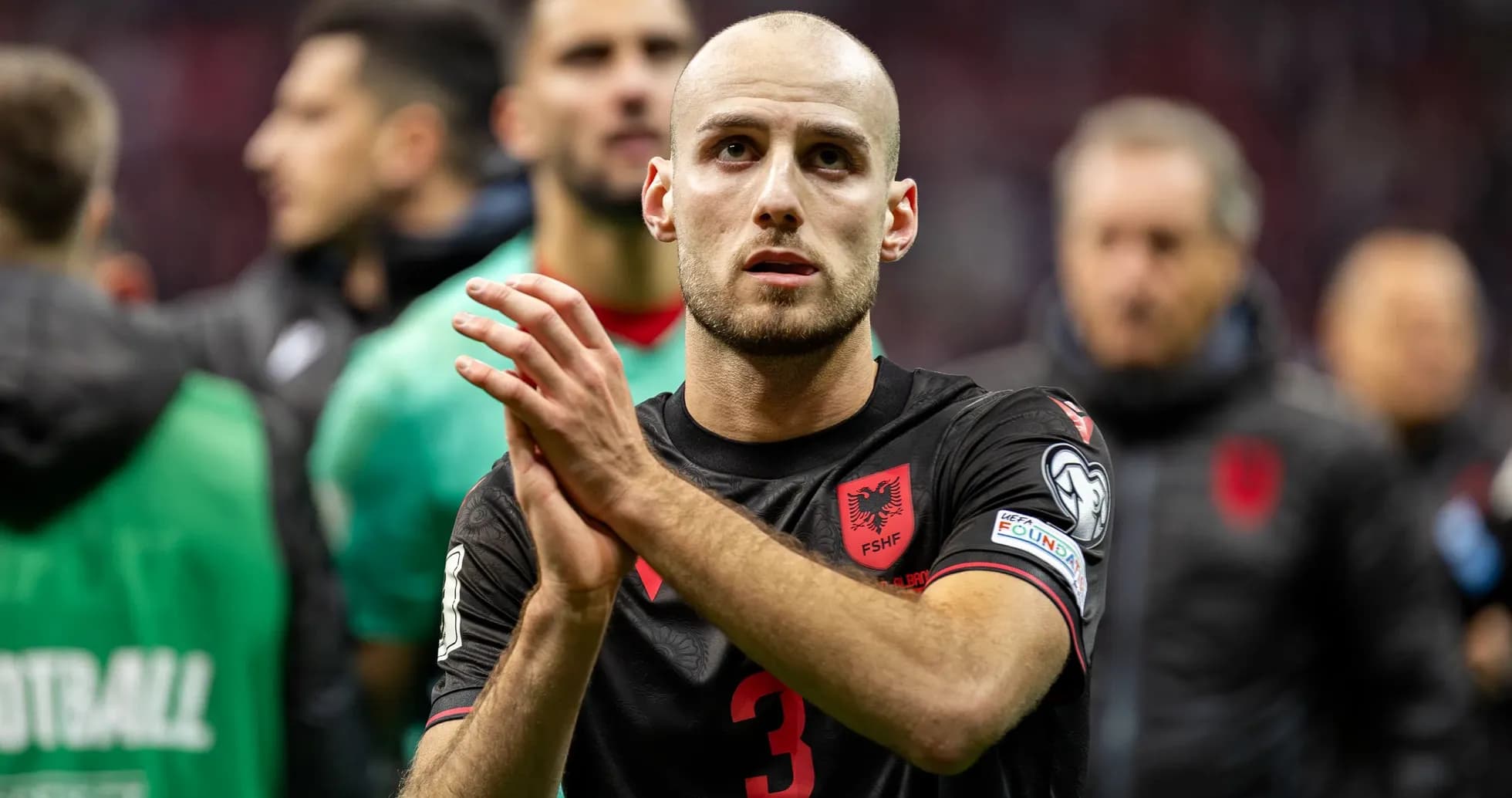 Player applauding after a match in Albania jersey Player applauding after a match in Albania jersey
