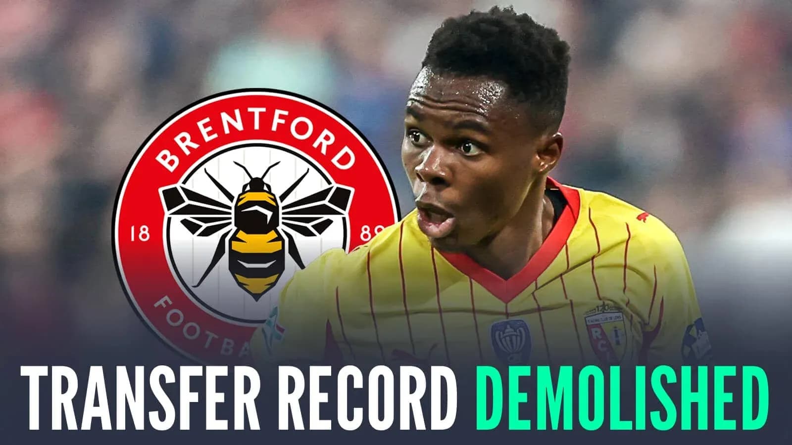Player celebrating with Brentford logo in background Player celebrating with Brentford logo in background