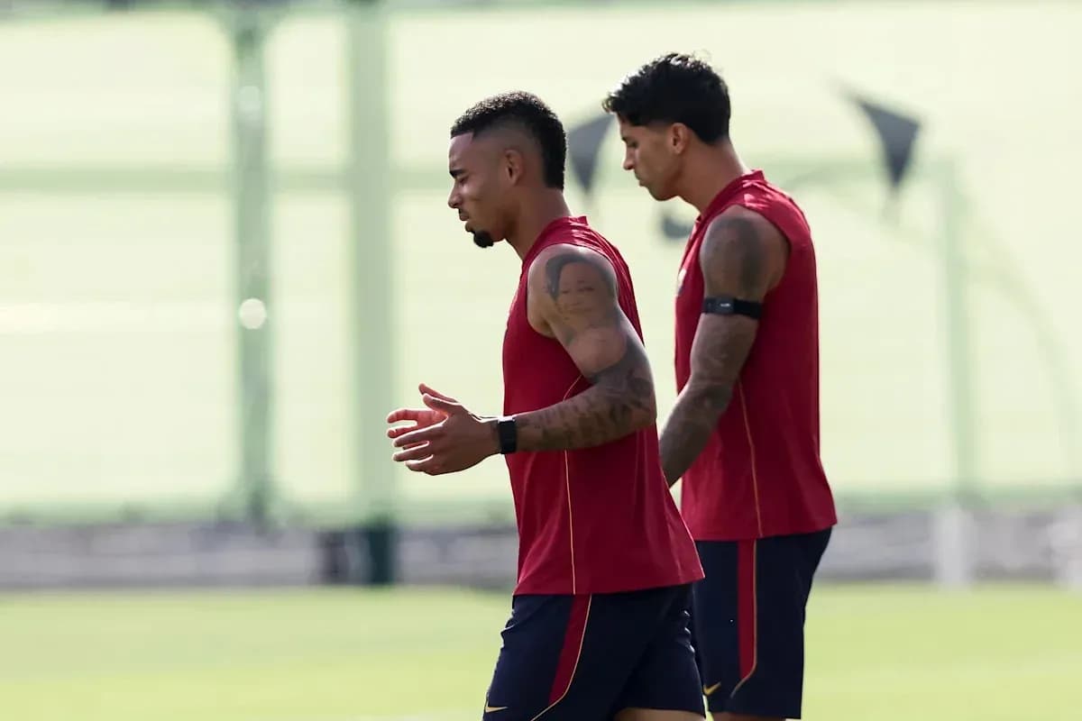Two players jogging during training session Two players jogging during training session