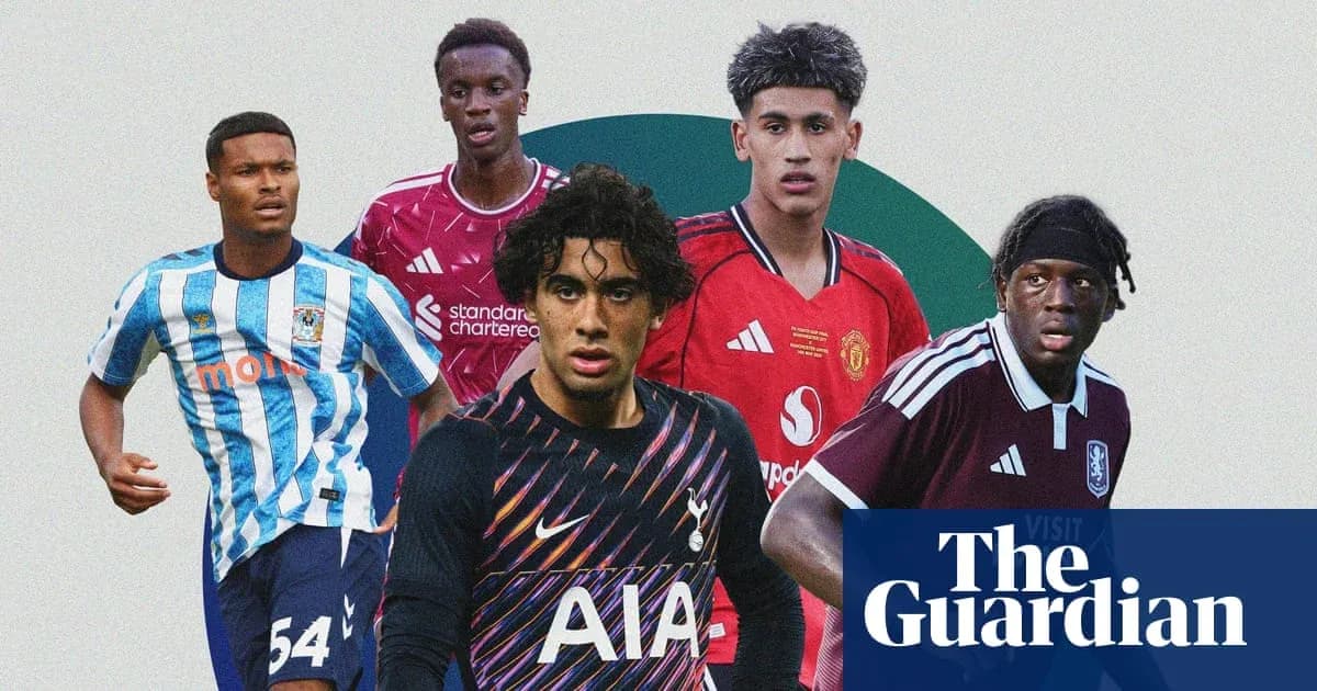 Five young football players in team jerseys Five young football players in team jerseys