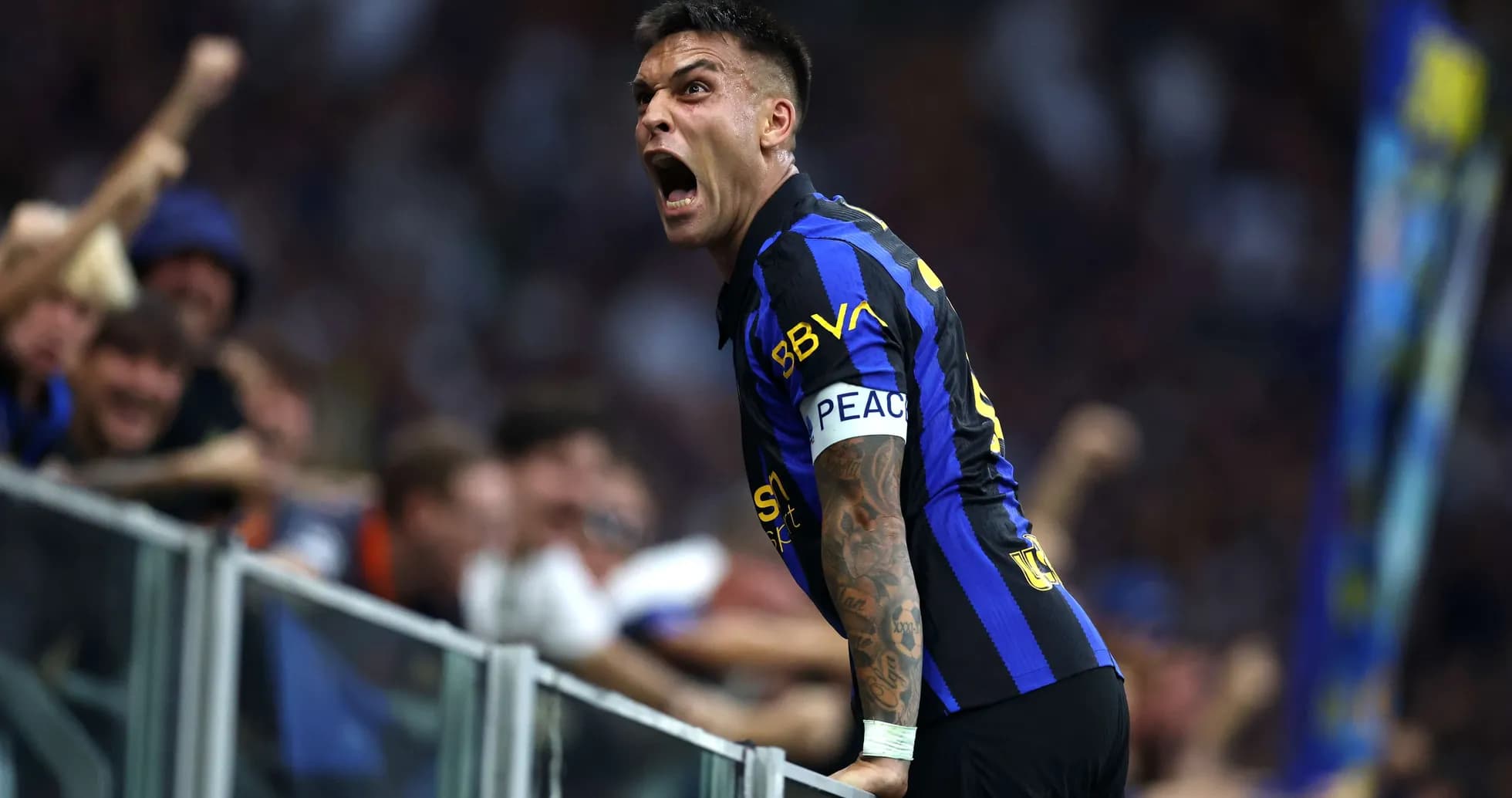 Lautaro Martínez celebrating with fans at Inter match Lautaro Martínez celebrating with fans at Inter match