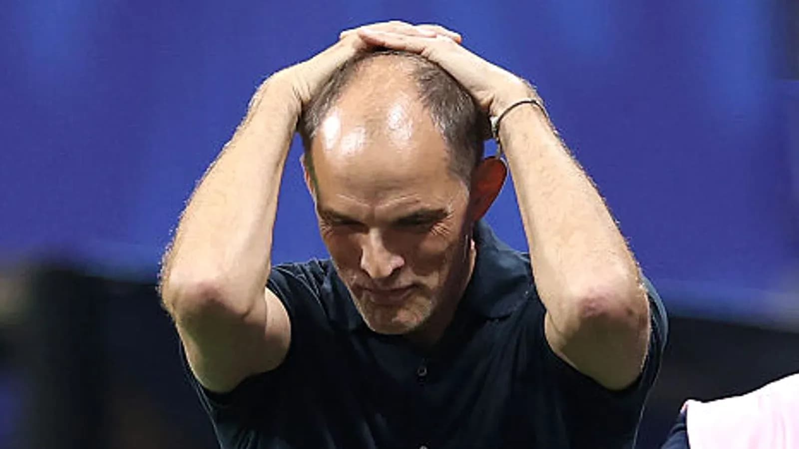 Coach with hands on head during match Coach with hands on head during match