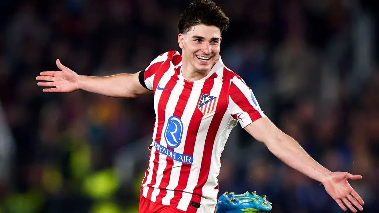 Atletico Madrid player celebrating a goal on field Atletico Madrid player celebrating a goal on field