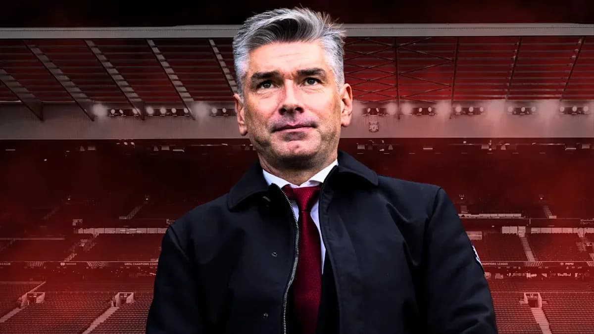 Coach standing in stadium with red background Coach standing in stadium with red background
