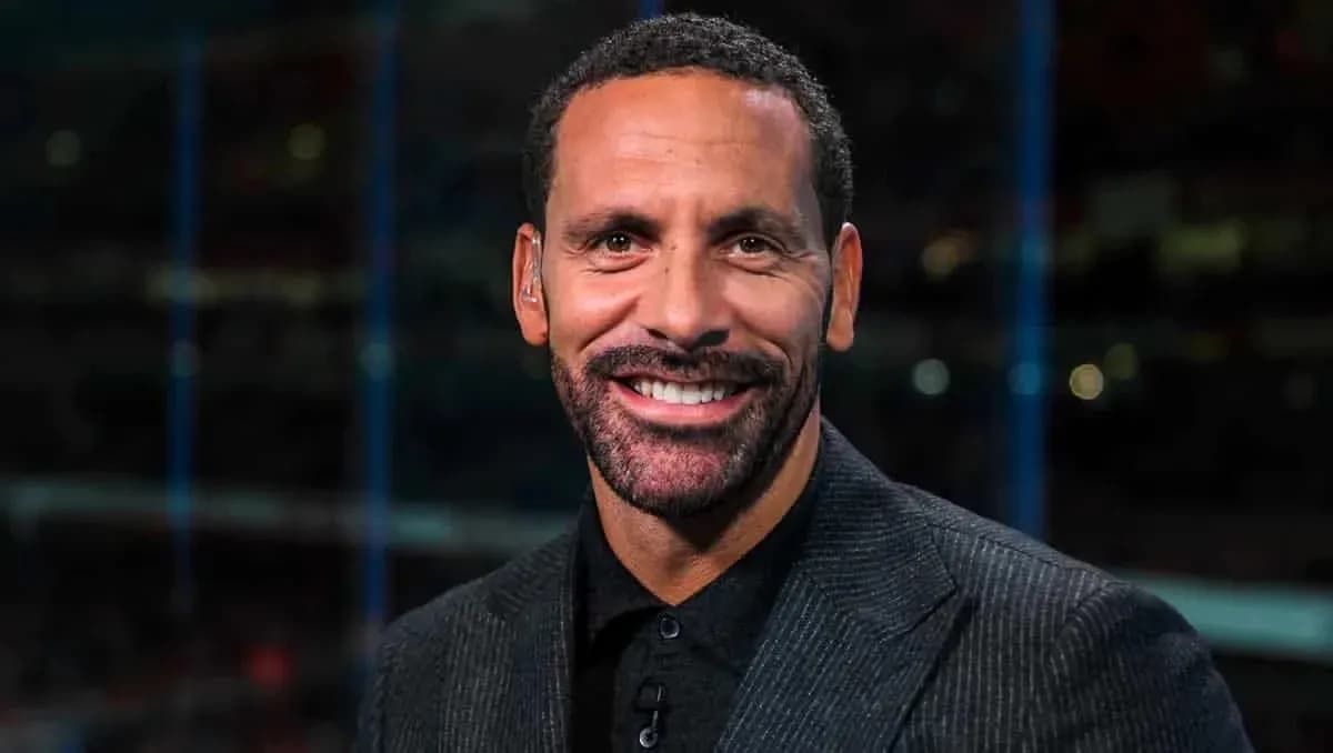 Sportscaster smiling during television broadcast Sportscaster smiling during television broadcast
