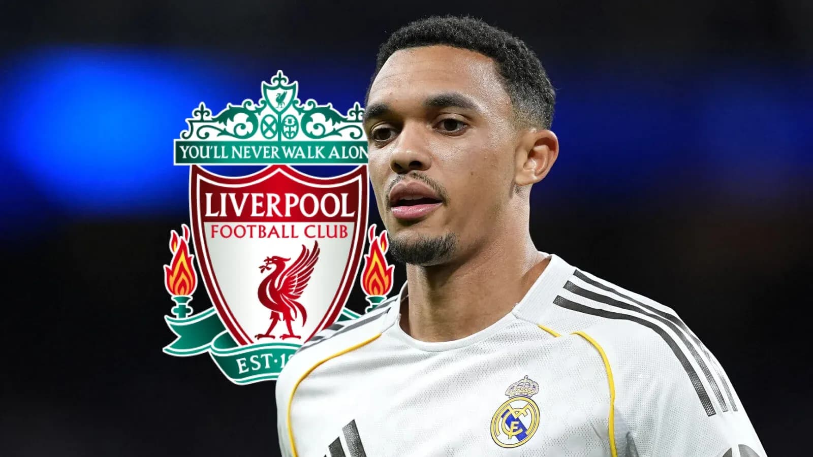 Player in kit with Liverpool logo in background Player in kit with Liverpool logo in background
