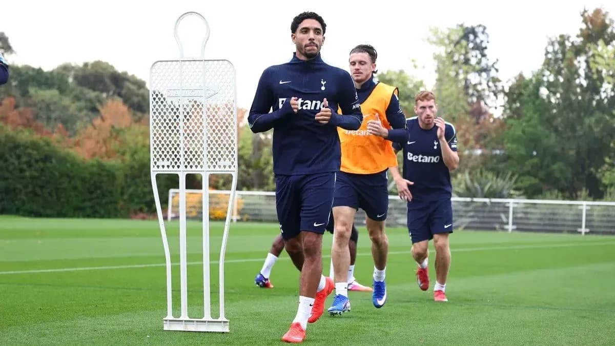 Players jogging during Tottenham training session Players jogging during Tottenham training session