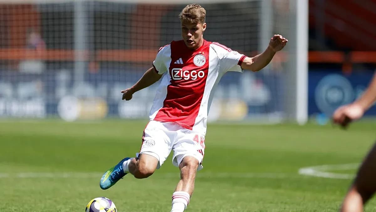 Ajax player kicking the ball during training session Ajax player kicking the ball during training session