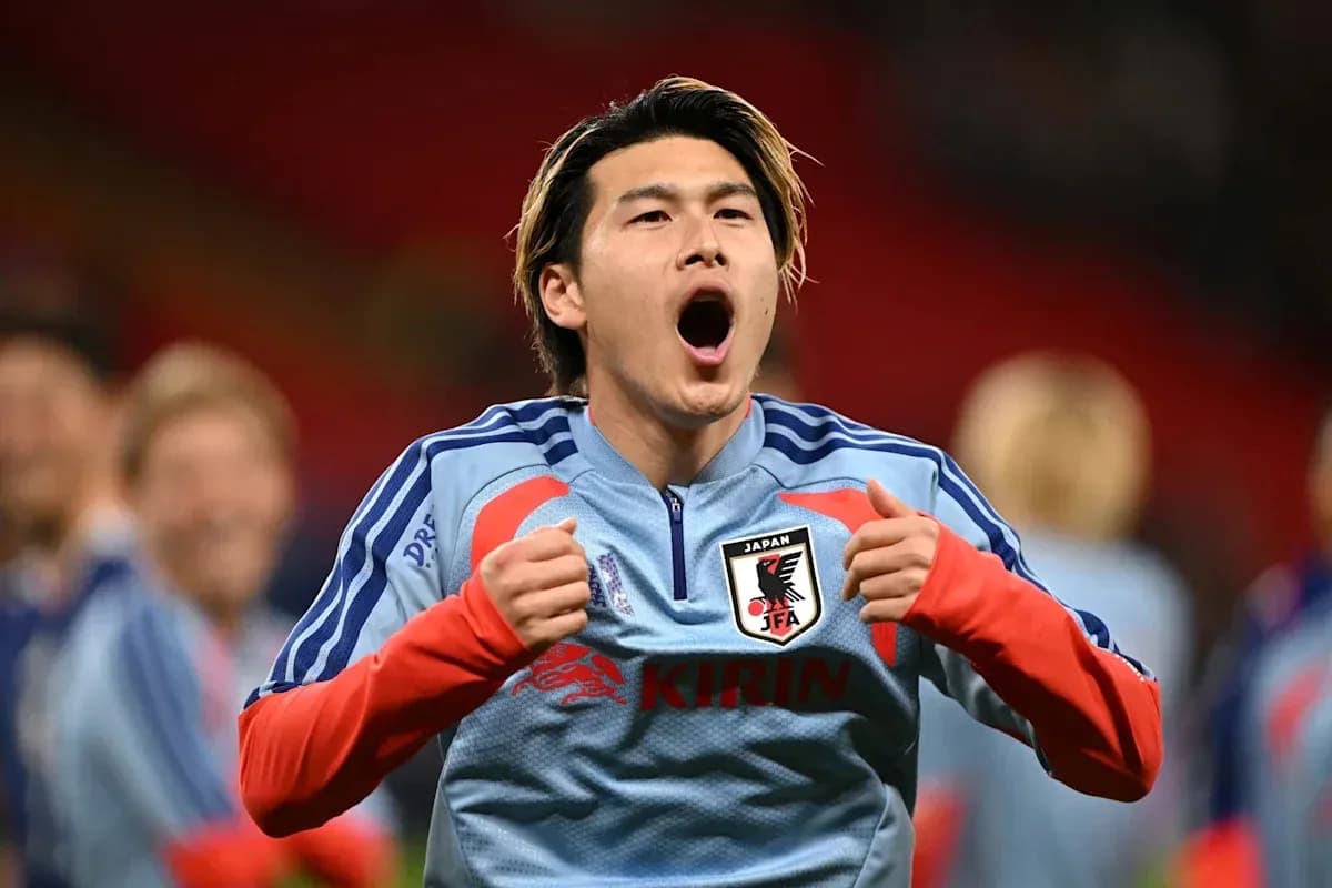 Player celebrating during pre-match warm-up for Japan Player celebrating during pre-match warm-up for Japan