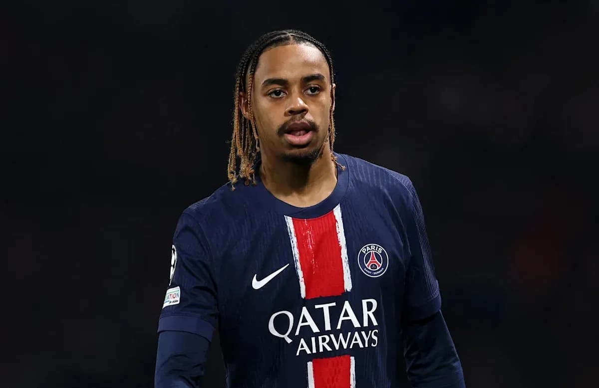 Player wearing PSG jersey during a match Player wearing PSG jersey during a match