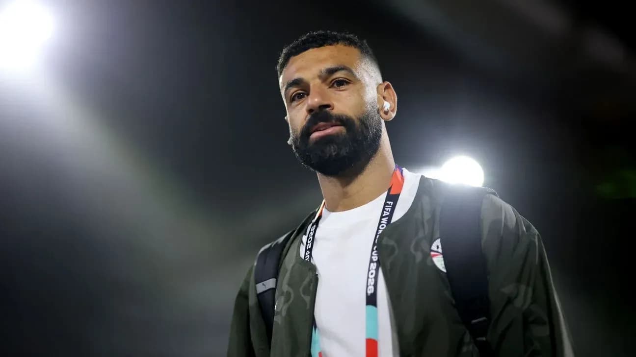 Player walking with headphones at a stadium Player walking with headphones at a stadium