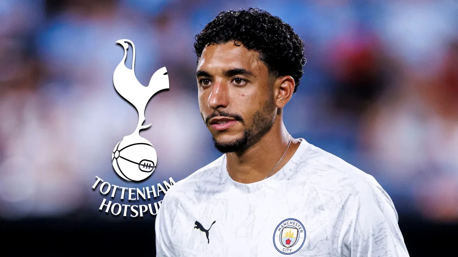 Player in Manchester City kit with Tottenham logo Player in Manchester City kit with Tottenham logo