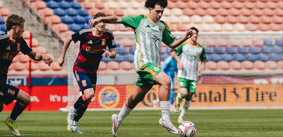 Player dribbling the ball during match Player dribbling the ball during match