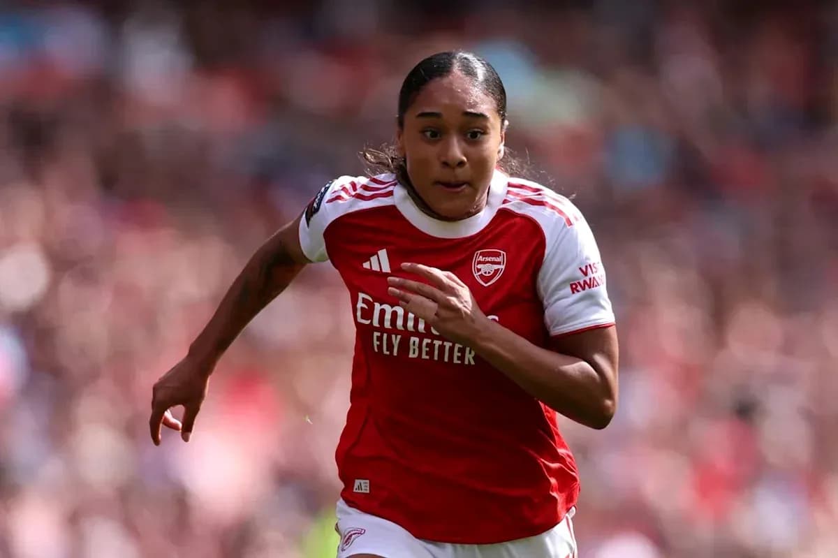 Player sprinting in Arsenal jersey during match Player sprinting in Arsenal jersey during match