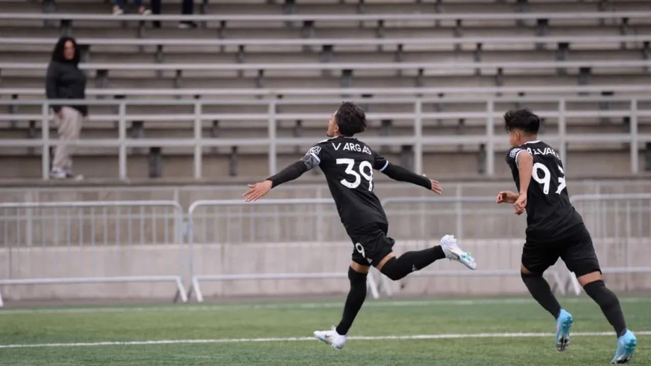 Vargas celebrating a goal during match Vargas celebrating a goal during match