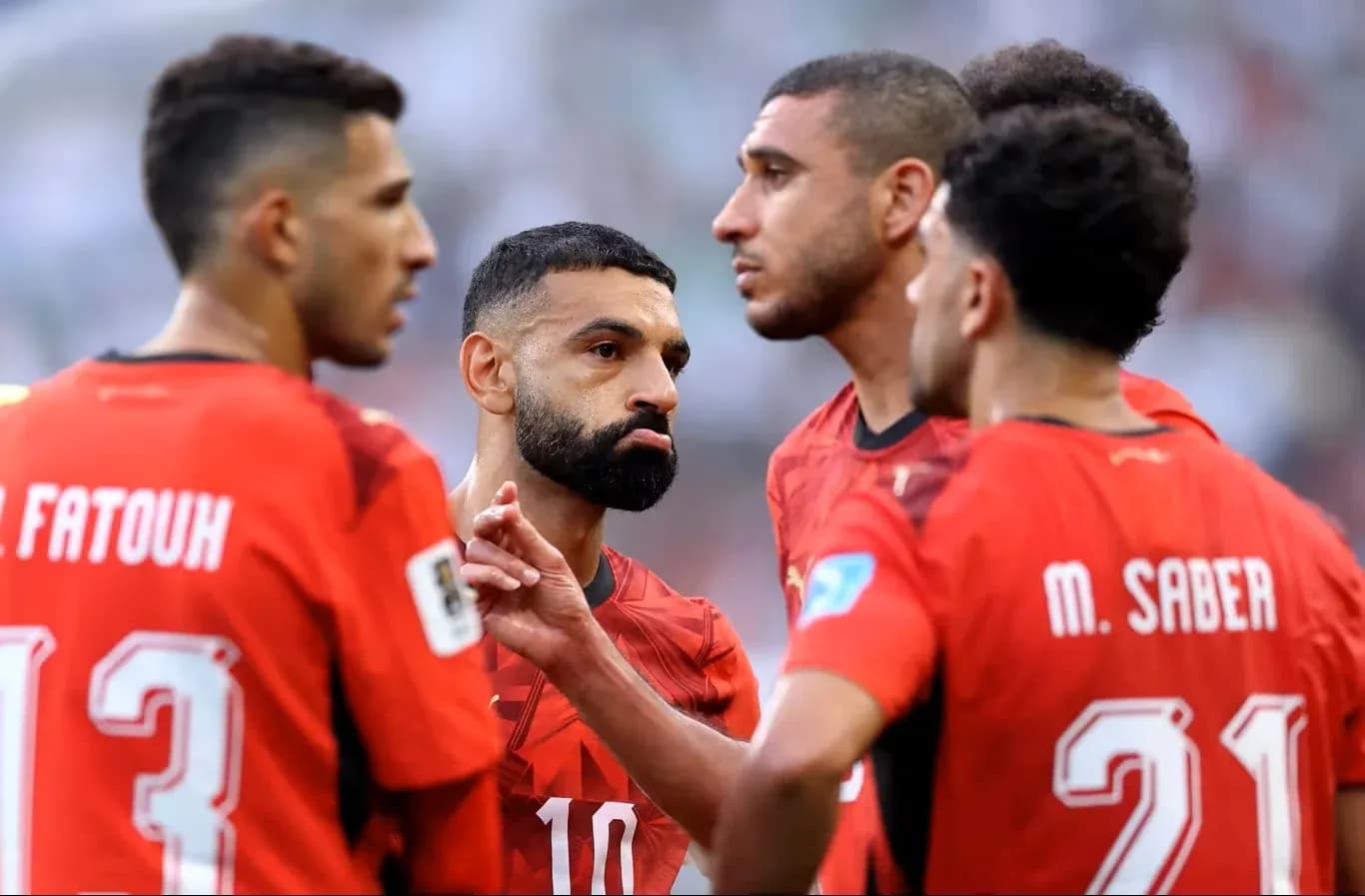 Egyptian players discussing during World Cup match Egyptian players discussing during World Cup match