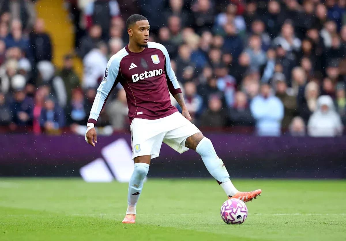 Player in Aston Villa kit preparing to kick the ball Player in Aston Villa kit preparing to kick the ball